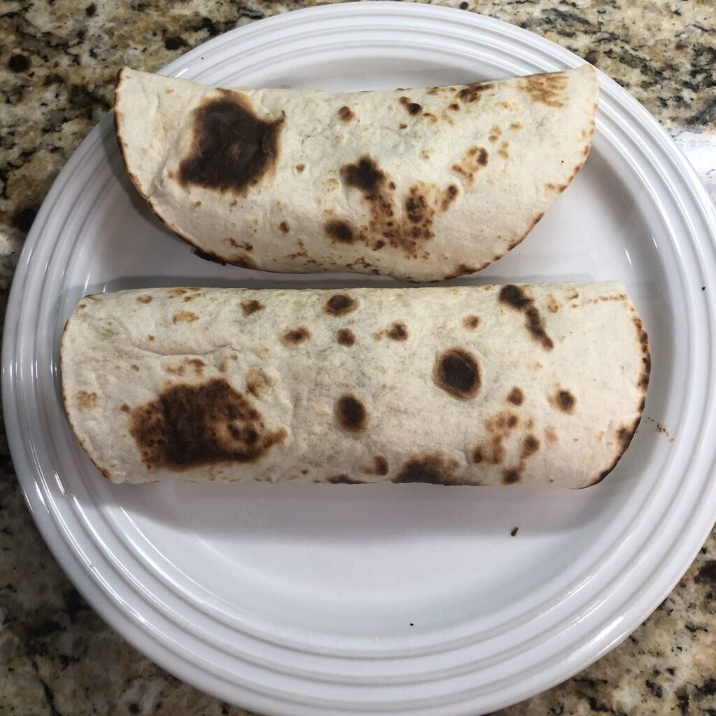 chicken fajitas wrapped in tortillas